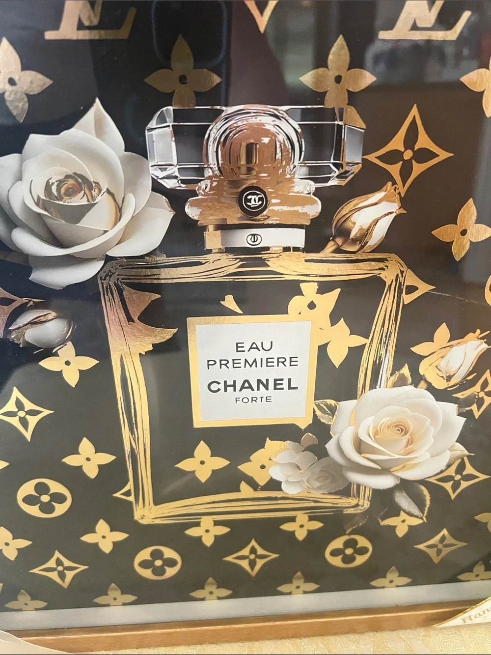 CHANEL Black and Gold Eau Première Framed Wall Art with White Floral Accents